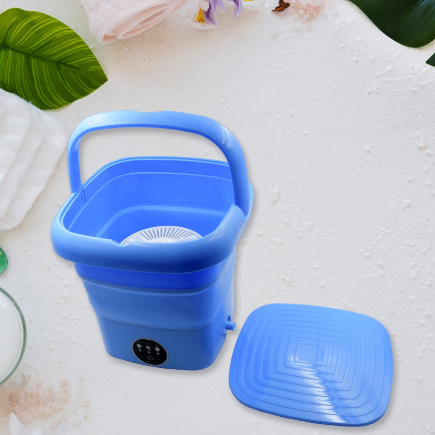 Foldable mini washing machine with drain basket, suitable for laundry and travel. Foldable mini washing machine with drain basket, suitable for laundry and travel.